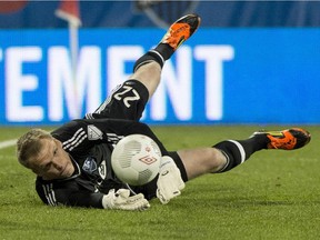 Impact goalkeeper Eric Kronberg makes a save against Toronto FC during first leg of Amway Canadian Championship semifinal on May 6, 2015 at Montreal's Saputo Stadium. The Impact won 1-0.