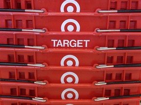 FILE - In this May 20, 2009 file photo, shopping baskets are stacked at a Chicago area Target store. Target says that about 40 million credit and debit card accounts customers may have been affected by a data breach that occurred at its U.S. stores between Nov. 27, 2013, and Dec. 15, 2013.