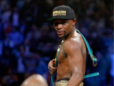 Floyd Mayweather Jr. celebrates the unanimous decision victory during the welterweight unification championship bout on May 2, 2015 at MGM Grand Garden Arena in Las Vegas, Nevada.