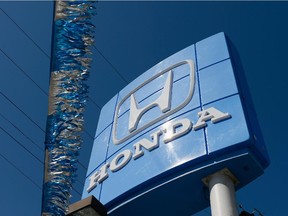 The Honda Motor Company logo.