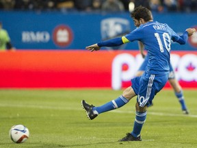 The Impact's Ignacio Piatti scores from the penalty spot against FC Dallas during MLS action at Montreal's Saputo Stadium on May 23, 2015.