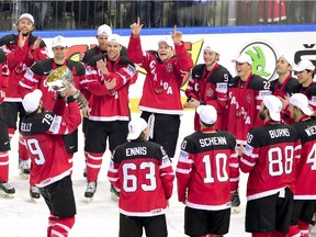 Forward Ryan O Reilly (L, No 79) of Canada raises the trophy of the IIHF Ice Hockey World Championship after winning the IIHF Ice Hockey World Championship final match Canada vs Russia on May 17, 2015 at the O2 Arena in Prague. Olympic champions Canada won the ice hockey world championship after sweeping defending champions Russia 6-1 in the final.