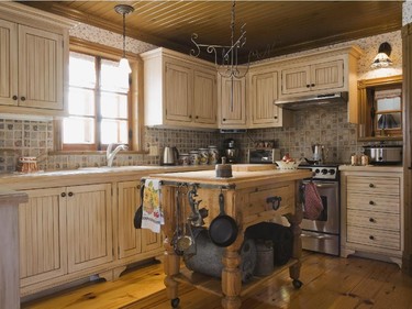 In the kitchen, the cupboard doors are flush with the frames, as was the custom back in the 1800s.