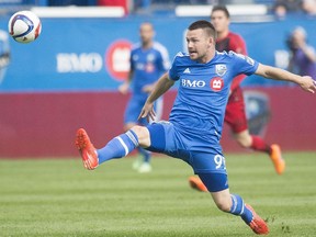 The Impact's Jack McInerney lunges for the ball during Major League Soccer game against the Portland Timbers at Montreal's Saputo Stadium on May 9, 2015. Portland won the game 2-1.
