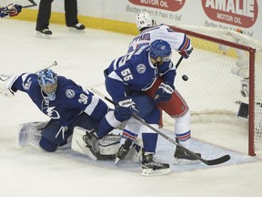 New York Rangers left wing James Sheppard (45) scores a goal againstTampa Bay Lightning goalie Ben Bishop (30) and defenceman Braydon Coburn (55) during the third period of Game 6 of the Eastern Conference finals in the NHL hockey Stanley Cup playoffs,Tuesday, May 26, 2015, in Tampa, Fla.