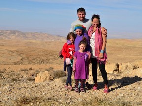 Jessica Ticktin and her husband, Adam Rubin, in Wadi Rum, Jordan, in December 2014 with their daughters (clockwise from bottom) Kaya, 5, Lola, 8, and Dahlia, 10.