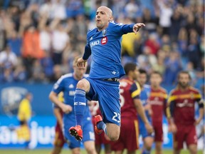 Montreal Impact's Laurent Ciman celebrates after scoring against Real Salt Lake during first half MLS soccer action in Montreal, Saturday, May 16, 2015.