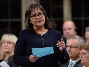Environment Minister Leona Aglukkaq responds to a question during question period in the House of Commons on Parliament Hill in Ottawa on Wednesday, Oct. 8, 2014.