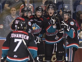 Kelowna Rockets Lucas Johansen, left to right, Cole Linaker, Chance Braid (scorer), Tomas Soustal, Joe Gatenby celebrate their first goal against the Quebec Remparts during first period action Friday, May 29, 2015 at the Memorial Cup in Quebec City.