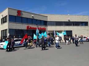 West Island teachers protested in Pointe-Claire on May 1 outside Jacques-Cartier MNA Geoff Kelley's office.