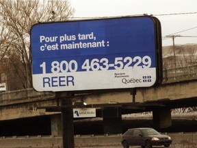 Montreal-05/01/14. Signs on the East and West bound HWY 20 Turcott Yards section put up by the Quebec government to remind people it's time to buy RRSP's.(Gazette-Richard Arless Jr)  BUSINESS--reporter P Delean--Slug RRSP--Neg 11059
Seasonal signage: Billboards on Highway 20 remind people it's time to buy RRSPs.