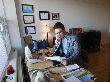 Mikey Colangelo Lauzon works at his desk at home.
