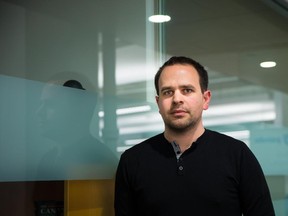 Mike Gozzo, product director of Radialpoint, poses for a photograph at the company offices in Montreal. Gozzo's first startup business, Appifier, had initial success but the company's decline had a heavy toll on his personal life.