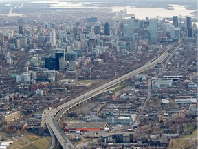 An aerial view of the Ville-Marie Expressway and Montreal's skyline, Sunday, April 26, 2015.
