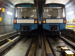 Two parked trains in the métro tunnels of the Blue Line.
