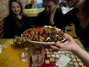 Poutine is wildly popular among most French ex-pats who flood local poutineries like La Banquise, ordering the “classic,” the “kamikaze” and the “pulled pork boogalou.”