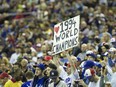 Expos fans salute members of the 1994 team during a pre-game ceremony to honour the team, prior to a pre-season MLB baseball at the Olympic Stadium in Montreal Saturday, March 29, 2014, between the Toronto Blue Jays and the New York Mets.  The Expos left Montreal in 2004.