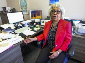 Jennifer Jones at work at KBHNS accountants in Montreal Thursday May 7, 2015. Thanks to the drug Perjeta, Jones is in remission after battling stage 4 breast cancer for two years. When she turns 65 on Friday her private insurance ends and Quebec doesn't cover the cost of this drug yet.