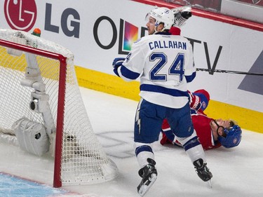 Montreal Canadiens defenceman Alexei Emelin falls to the surface after being upended by Tampa Bay Lightning right wing Ryan Callahan during NHL semifinal action at the Bell Centre in Montreal on Friday May 1, 2015.
