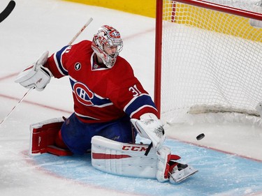 Montreal Canadiens goalie Carey Price looks back to see the puck after Tampa Bay Lightning right wing Nikita Kucherov scored in doubly overtime to win 2-1 during NHL semifinal action at the Bell Centre in Montreal on Friday May 1, 2015.
