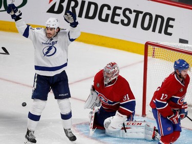 Tampa Bay Lightning centre Brian Boyle celebrates beating Montreal Canadiens goalie Carey Price to win 2-1 in overtime during NHL semifinal action at the Bell Centre in Montreal on Friday May 1, 2015.