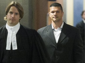 Amir El Alfy, right, and his lawyer Dylan Jones leave Montreal courtroom on Monday May 11, 2015.