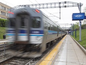 MONTREAL, QUE.: MAY 11, 2015 -- AMT train leaves Mount-Royal station on its way to Central Station on Monday May 11, 2015. It's still not clear who is going to drive AMT trains after the AMT is abolished within the next few years. The new organization will be called the reseau de transports. (Pierre Obendrauf / MONTREAL GAZETTE)