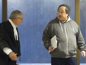 Henry Wong, right, a former basketball coach with Sun Youth and Vanier College, with his lawyer Louis Morena on Thursday. He received a 20-month conditional sentence that he is allowed to serve in the community.