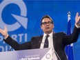 Newly elected PQ leader Pierre Karl Peladeau, speaks to supporters following his first ballot win in Quebec city on May 15.