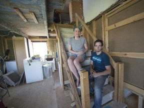 Heidi Walch, left, and Ray Lemoine  are helping to fix up the home their friend Evan Thifault purchased before his death.