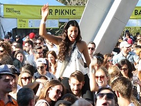 Revellers enjoy electronic music during a previous Piknic Electronik, on Ile Ste Hélène.