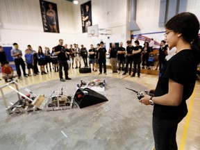 Grade 7 student Sophia Gnehm participates in St-George's School's Sumo Robotics Competition on Wednesday, May 20. The annual contest features student-built robots that must eject all other robots from the playing surface to win.