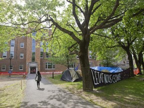 A student arrives at Collège de Maisonneuve in Montreal on Thursday May 21, 2015.