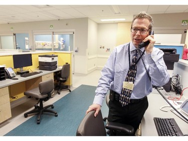 Dr. Harley Eisman, head of emergency medecine, takes a phone call in the ER during tour of the new Montreal Children's Hospital at the Glen Site in Montreal.