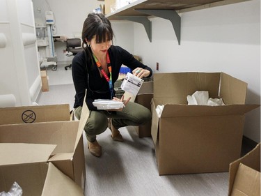 ER clerk Esperanza Yanez unpacks supplies in the emergency department at the new Montreal Children's Hospital at the Glen Site in Montreal.