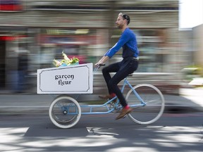 "Flowers that grew outdoors with sun and earth and rain smell better and look better to me," says Raphaël Gaspard, who makes deliveries by bike from his store Garçon Fleur.