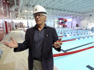 Dorval Mayor Edgar Rouleau on the deck of the pool during a tour of the city's new sports centre. The complex houses an aquatics centre, a gymnasium and exercise studios.