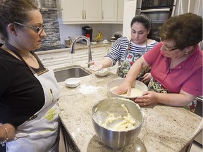 Nutella crostata being made by Cathy Giannini, left, her older daughter Tania Di Genova, centre, and her mother Connie Giannini.