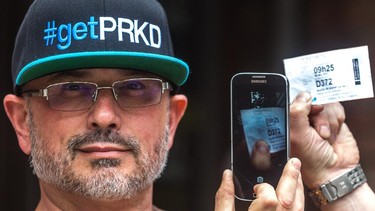 Oliver Bleuer registers a parking stub to his app GetPrkd, which allows Montrealers to find out if the spot where they are parked has time left in the meter.
