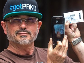 Oliver Bleuer registers a parking stub to his app GetPrkd, which allows Montrealers to find out if the spot where they are parked has time left in the meter.