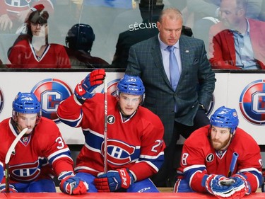 Canadiens head coach Michel Therrien, top, reacts after the Canadiens were scored on by Tampa Bay Lightning center Steven Stamkos, not pictured, during the second period of game two of their NHL eastern conference semi-final hockey series at the Bell Centre in Montreal on Sunday, May 3, 2015.
