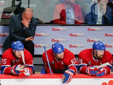 Canadiens head coach Michel Therrien, top, reacts to the team's loss during the third period of game two of their NHL eastern conference semi-final hockey series against the Tampa Bay Lightning at the Bell Centre in Montreal on Sunday, May 3, 2015.