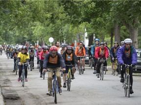 Cyclists make their way through Ville Émard on Sunday.
