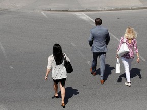 Pedestrians must yield to cars if they are not obligated to stop at intersections, police say.