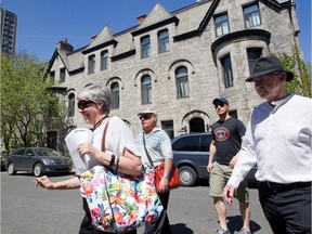Ann Robinson, left, of The Montreal Urban Ecology Centre, leads a 'Jane's Walk' in the Shaughnessy Village area of Montreal Sunday, May 5, 2013. A Jane's Walk is a guided walking tour that promotes local, neighbourhood knowledge. The alks were started in honour of the late authour/activist Jane Jacobs in Toronto, the city where the U.S. born activist lived her last years.