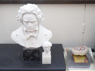A bust of Beethoven sits in his living room.