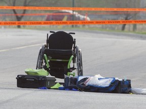 A wheelchair sits on rue Yves-Blais in Terrebonne May 7, 2015, after the man in it was fatally shot Wednesday night.