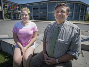 Lindsay Place High School teacher John Kesson, right, and student Clara Sweetman-Hammond, in Pointe-Claire on Thursday, May 7, 2015. Kesson was selected to receive the 2015 Pat Lewis Humanitarian Award from the Quebec Federation of Home and School Associations for his work working with his students that has raised about $100,000 for people in need and for food and products donated to the Old Brewery Mission in Montreal.