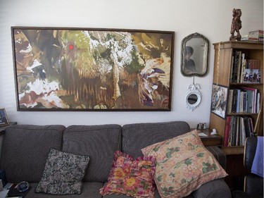 Painting by Jack Tremblay hangs in his living room.
