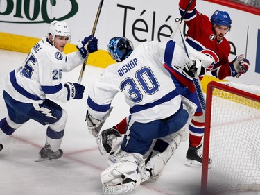 MONTREAL, QUE.: MAY 9, 2015-- Montreal Canadiens center Torrey Mitchell celebrates the opening goal against Tampa Bay Lightning goalie Ben Bishop as Tampa Bay Lightning defenseman Matt Carle looks on. during NHL Eastern Conference semifinal action in Montreal on Saturday May 9, 2015.  Mitchell assisted on the goal scored by Montreal Canadiens right wing Devante Smith-Pelly. (Allen McInnis / MONTREAL GAZETTE)